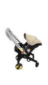 Shop Doona Infant Car Seat & Stroller Combo, 2024, Limited Edition Beige/Warm Stone at Goodbuygears