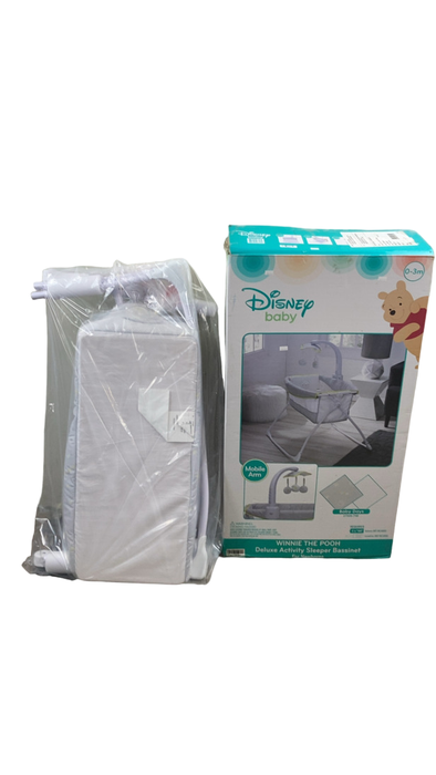 Shop Delta Children Deluxe Activity Sleeper Bedside Bassinet, Disney Baby Winnie The Pooh at Goodbuygears
