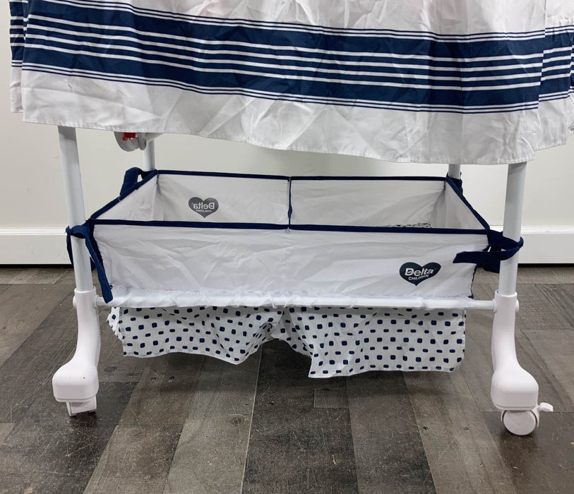 Shop Delta Children Deluxe Gliding Bassinet at Goodbuygears