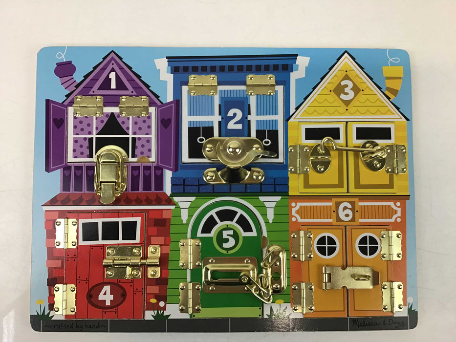 used Melissa & Doug Latches Board