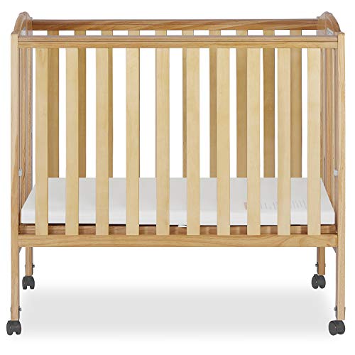 used Dream On Me 2-in-1 Portable Folding Stationary Crib