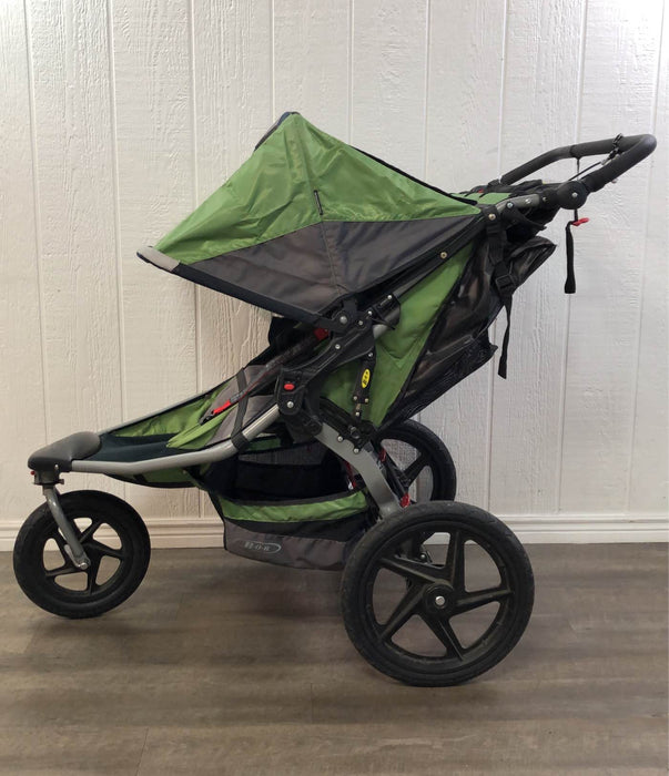 Shop BOB Revolution Duallie Stroller, 2015, Green, Pro at Goodbuygears