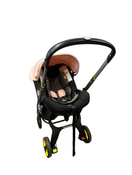 used Doona Infant Car Seat & Stroller Combo, 2021, Blush Pink