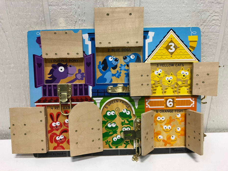 secondhand Melissa & Doug Latches Board