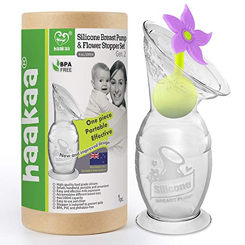 used Haakaa Silicone Breast Pump And Flower Stopper Set