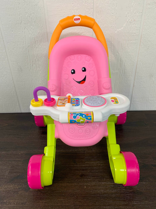 used Fisher Price Stroll N Learn Walker