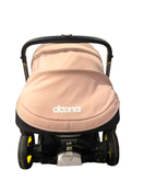 used Doona Infant Car Seat & Stroller Combo, 2021, Blush Pink