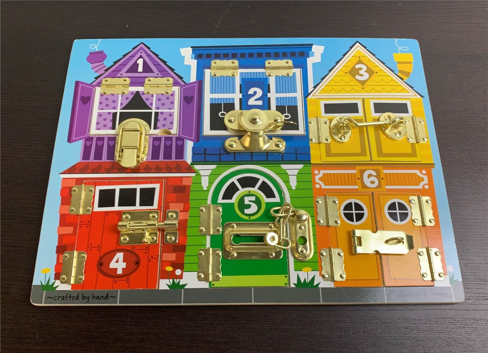 used Melissa & Doug Latches Board