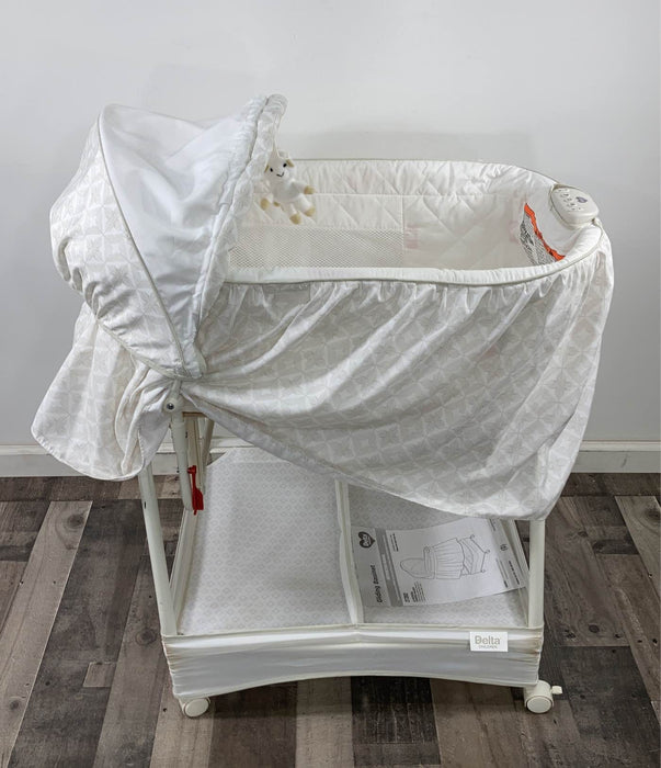 Shop Delta Children Deluxe Gliding Bassinet at Goodbuygears