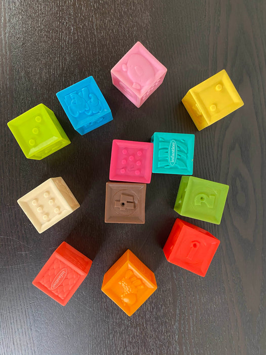 secondhand Infantino Squeeze & Stack Block Set