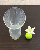 used Haakaa Silicone Breast Pump And Flower Stopper Set