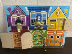 secondhand Melissa & Doug Latches Board