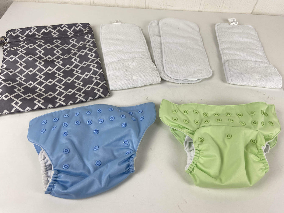 used BUNDLE Cloth Diapers, And Wetbag