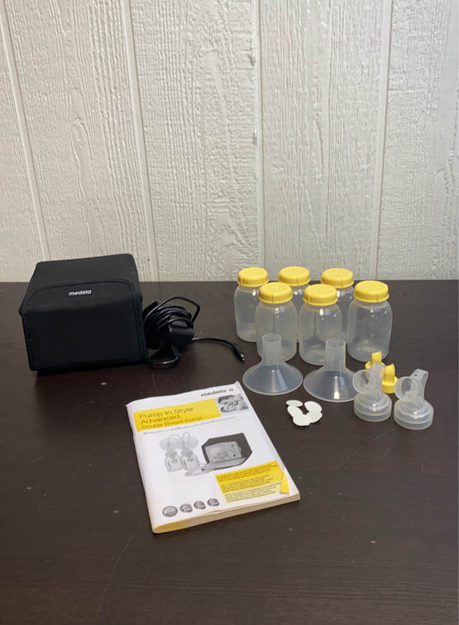 used Medela Pump In Style Advanced Breast Pump, with accessories (24 mm)