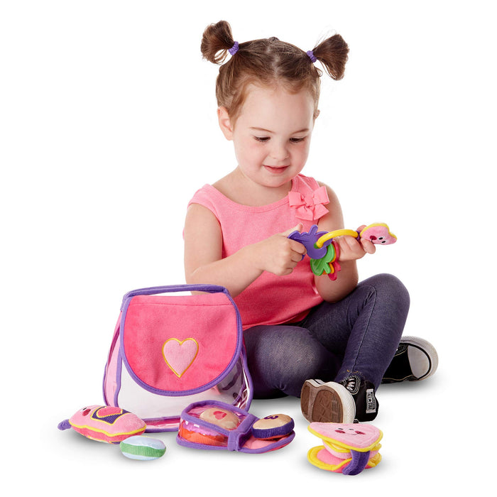 used Melissa & Doug Fill & Spill Purse