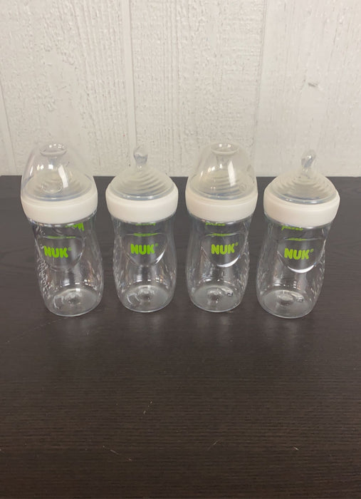 used BUNDLE NUK Baby Bottles