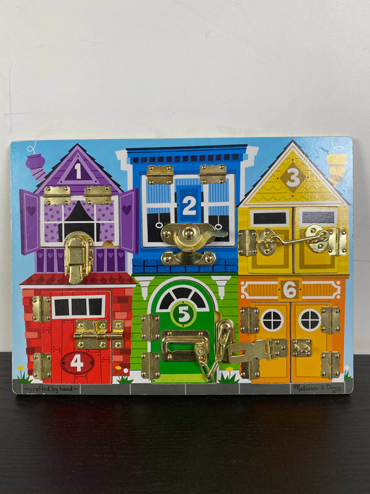 used Melissa & Doug Latches Board
