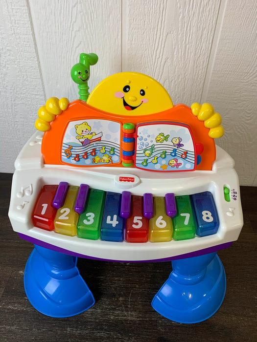 secondhand Fisher Price Interactive Baby Grand Piano