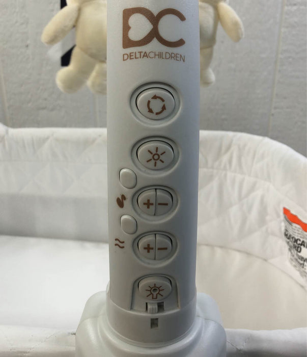 Shop Delta Children Deluxe Gliding Bassinet at Goodbuygears