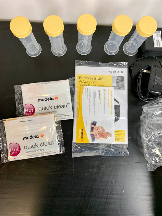 secondhand Medela Breast Pump & Bottles