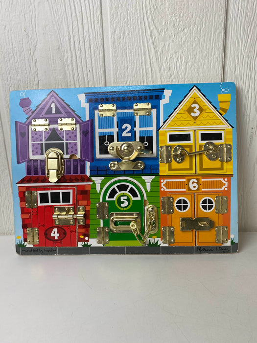 used Melissa & Doug Latches Board
