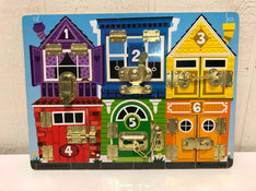 used Melissa & Doug Latches Board