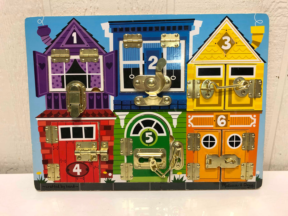 used Melissa & Doug Latches Board