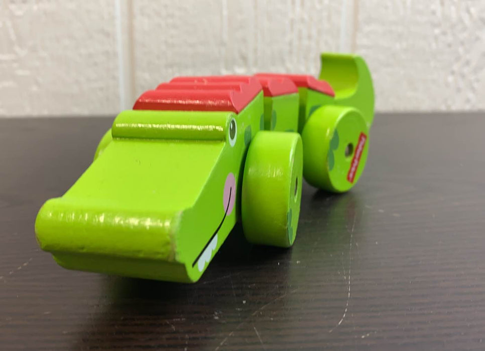 secondhand Fisher Price My First Wiggly Crocodile On Wheels