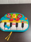 secondhand Fisher Price Kick N Play Crib Piano