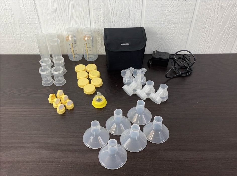 used Medela Pump In Style Advanced Breast Pump, With accessories