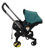Shop Doona Infant Car Seat & Stroller Combo, 2023, Racing Green at Goodbuygears