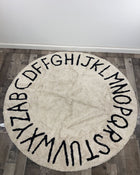 used Lorena Canals Round ABC Washable Rug