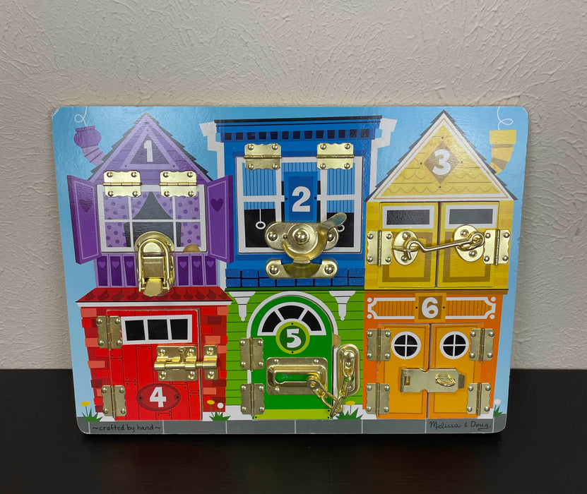 used Melissa & Doug Latches Board