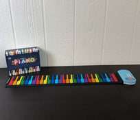 used Let’s Go Roll Up Piano